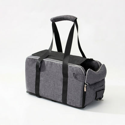 Gray 2-in-1 center console dog car seat and portable carrier with black straps, shown on a white background.