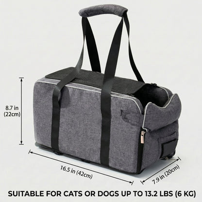 Gray 2-in-1 center console dog car seat and portable carrier on a white background with black straps and carry handles.
