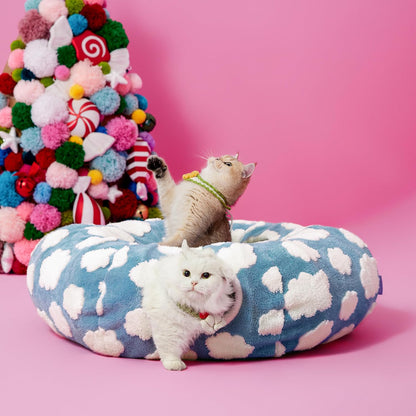 Blue Cloud variant — two cats on the donut cat tunnel bed in a pink studio set with a pom-pom tree backdrop.