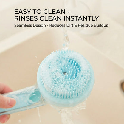 Blue 2-in-1 pet bath massage brush and shampoo dispenser rinsed under running water in a beige bathroom.