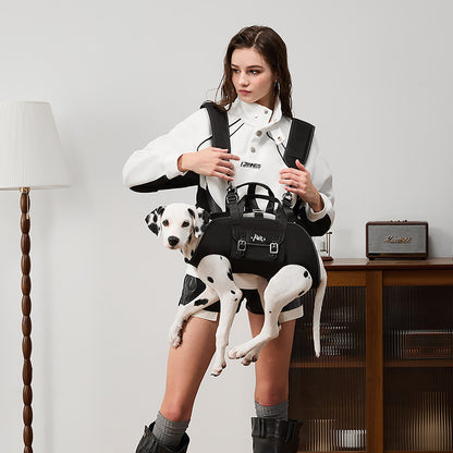 Stylish woman in white sweater and black leather shorts carrying a Dalmatian dog in front carry mode using the PawsMore black 3-in-1 hands-free dog carrier backpack indoors, showing the heavy-duty metal buckles, padded shoulder straps, and ergonomic Oxford fabric carrier body that supports dogs from 4.5 to 60 pounds