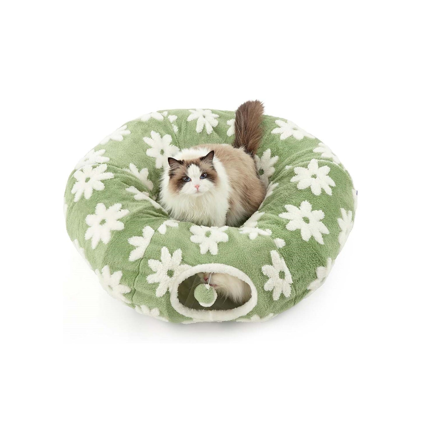 Ragdoll cat resting in the center cushion of the sage-green floral cat tunnel bed, with the tunnel peek-hole visible.