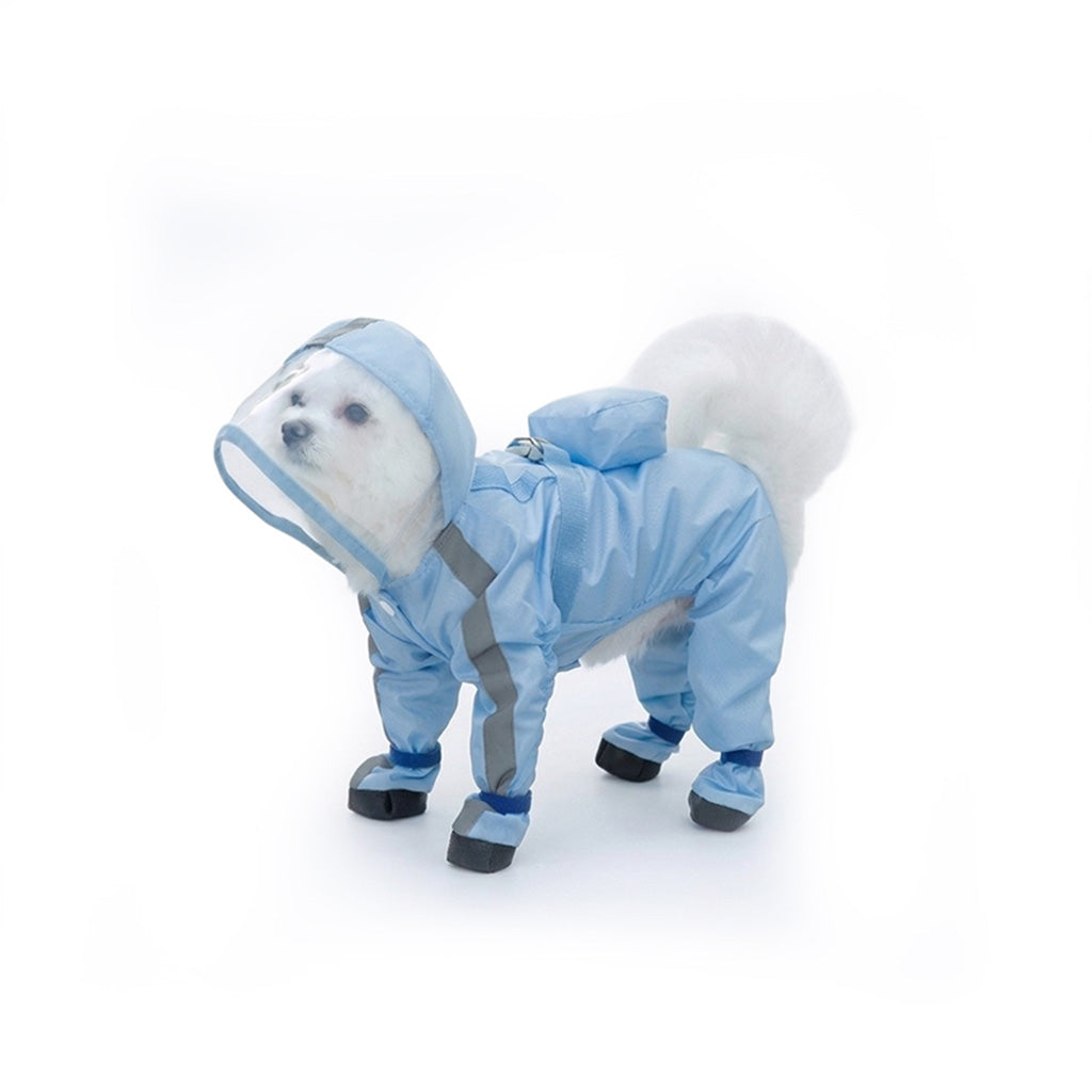 Small white dog wearing a sky blue full-body dog raincoat with clear hood, reflective strips, and attached boots.