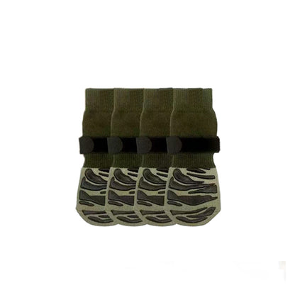 Olive green anti-slip dog socks with black grips, shown as four leg warmers on a white background.