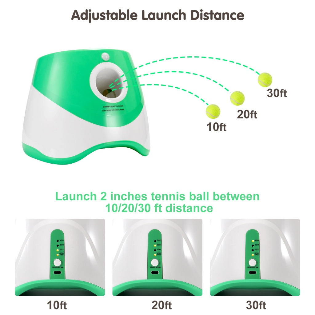 White-background studio shot of a green-and-white automatic dog ball launcher with 10, 20, and 30 ft tennis ball settings.