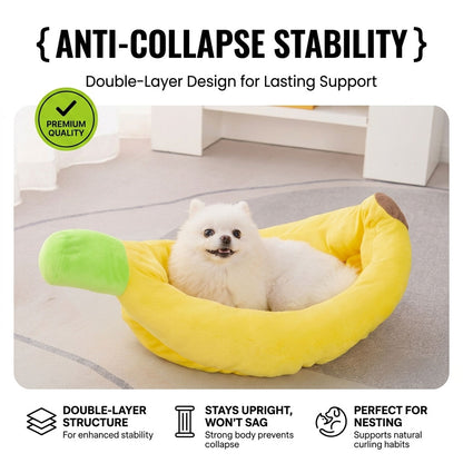 Small white Pomeranian sitting happily inside a sturdy banana pet bed, highlighting its double-layer anti-collapse stability and nesting support.