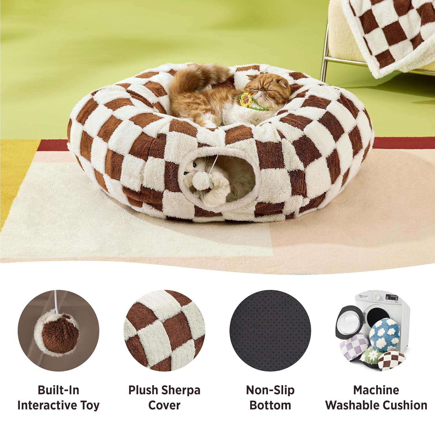 Brown checkered cat tunnel bed feature shot — Sherpa cover, non-slip base, machine-washable cushion, built-in pom-pom toy.