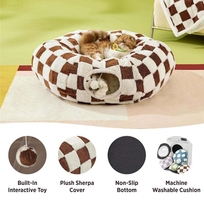 Brown checkered cat tunnel bed feature shot — Sherpa cover, non-slip base, machine-washable cushion, built-in pom-pom toy.