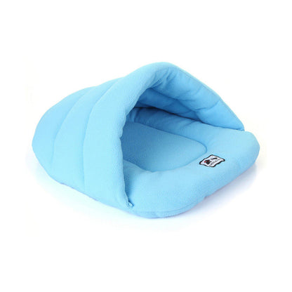 Sky blue fleece pet cave bed with open hooded sleeping-bag design for cats and small dogs.