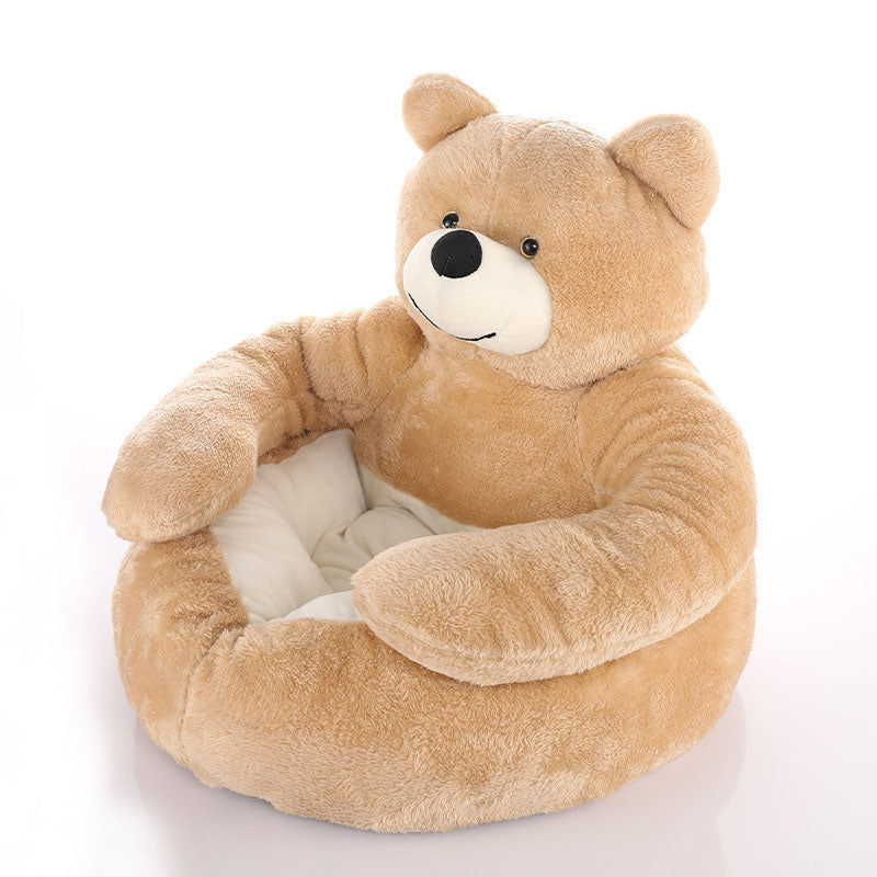Studio product shot of the PawsMore calming teddy bear pet bed in a soft Khaki color, showcasing its plush, wrap-around arms designed for pet anxiety relief.