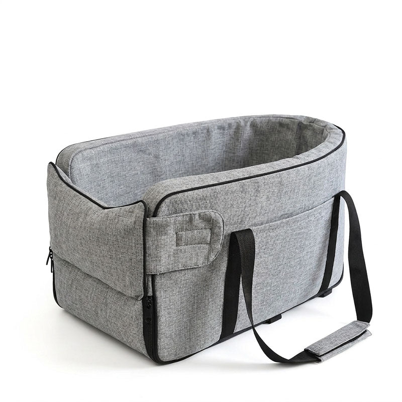 Heather grey durable polyester center console dog car seat with carrying handles and spacious side storage pockets.