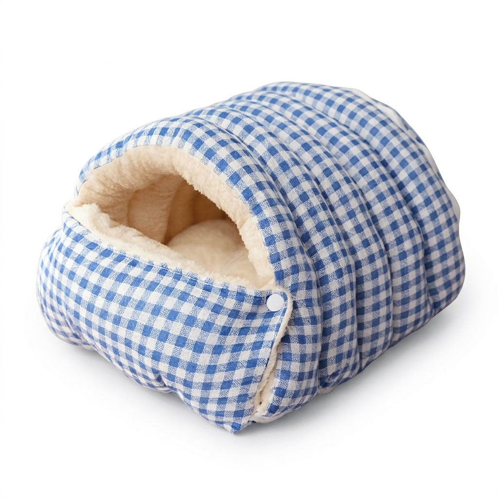 Classic blue gingham cave pet bed with rounded opening and cream plush lining.