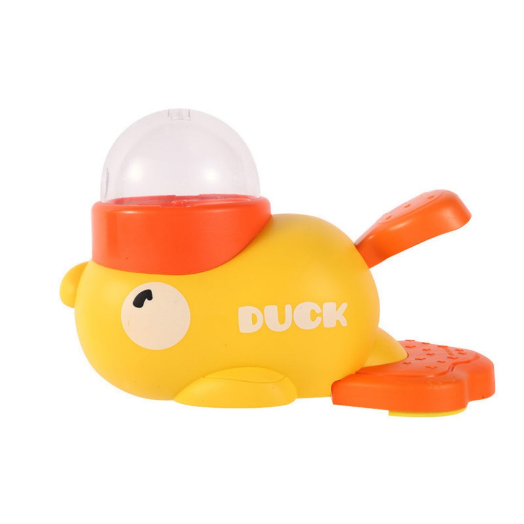 Yellow interactive duck puzzle toy with orange treat dispenser, clear dome, and white background.