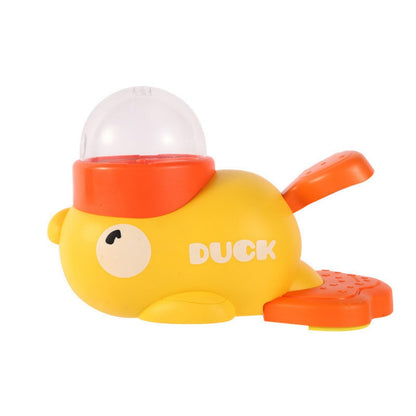 Yellow interactive duck puzzle toy with orange treat dispenser, clear dome, and white background.