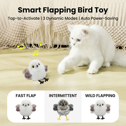 A white cat interacting with a snowy owl cat toy, with dynamic motion lines and icons below displaying the three flapping modes: Fast Flap, Intermittent, and Wild Flapping.