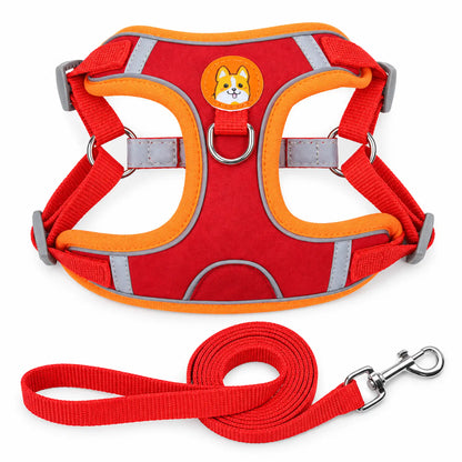 Red suede-like step-in dog harness with reflective trim, corgi patch and matching leash.