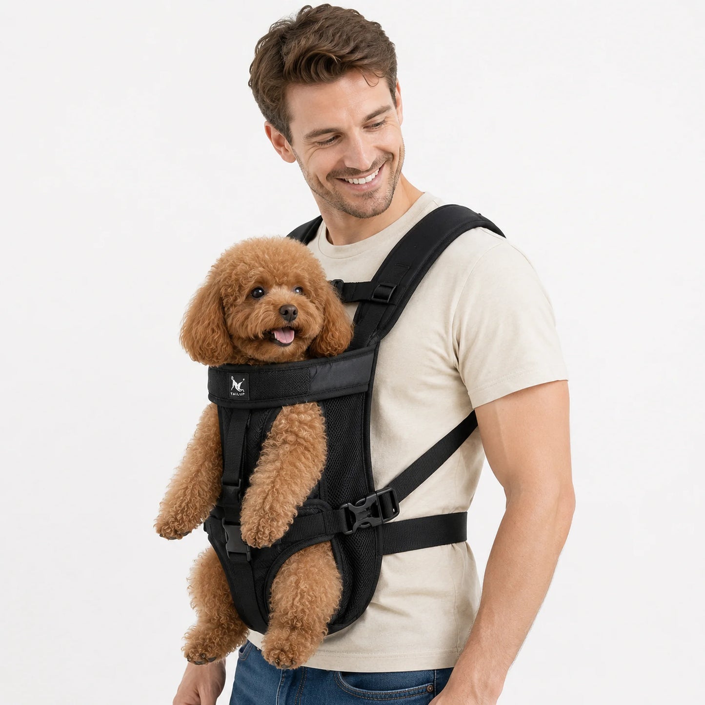 Wearing demonstration for black front-facing pet carrier with small dog