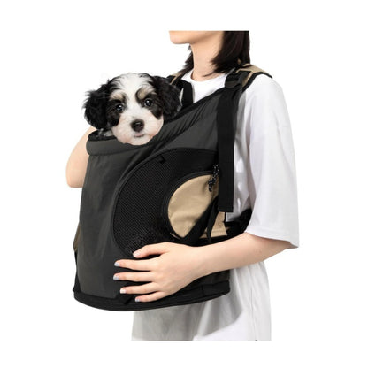 Black front pet carrier worn with a small dog inside