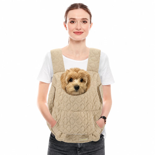 Khaki quilted front pet carrier worn by a woman with a small dog seated inside