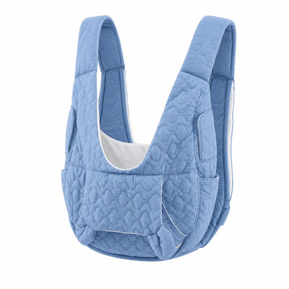 Royal blue quilted front pet carrier with padded shoulder straps and side pockets