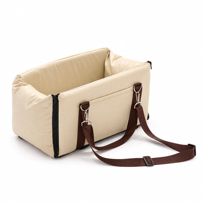 Beige console pet carrier with brown carry straps, metal hooks and black front zippers