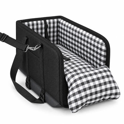 Black console dog car seat with gingham lining, a removable cushion and metal strap clips.