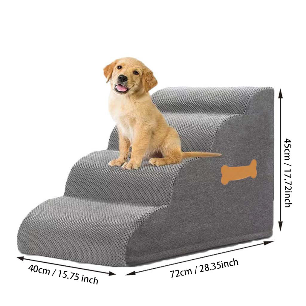 Golden Retriever puppy sitting securely on a tall 4-step orthopedic dog stair designed for high beds.