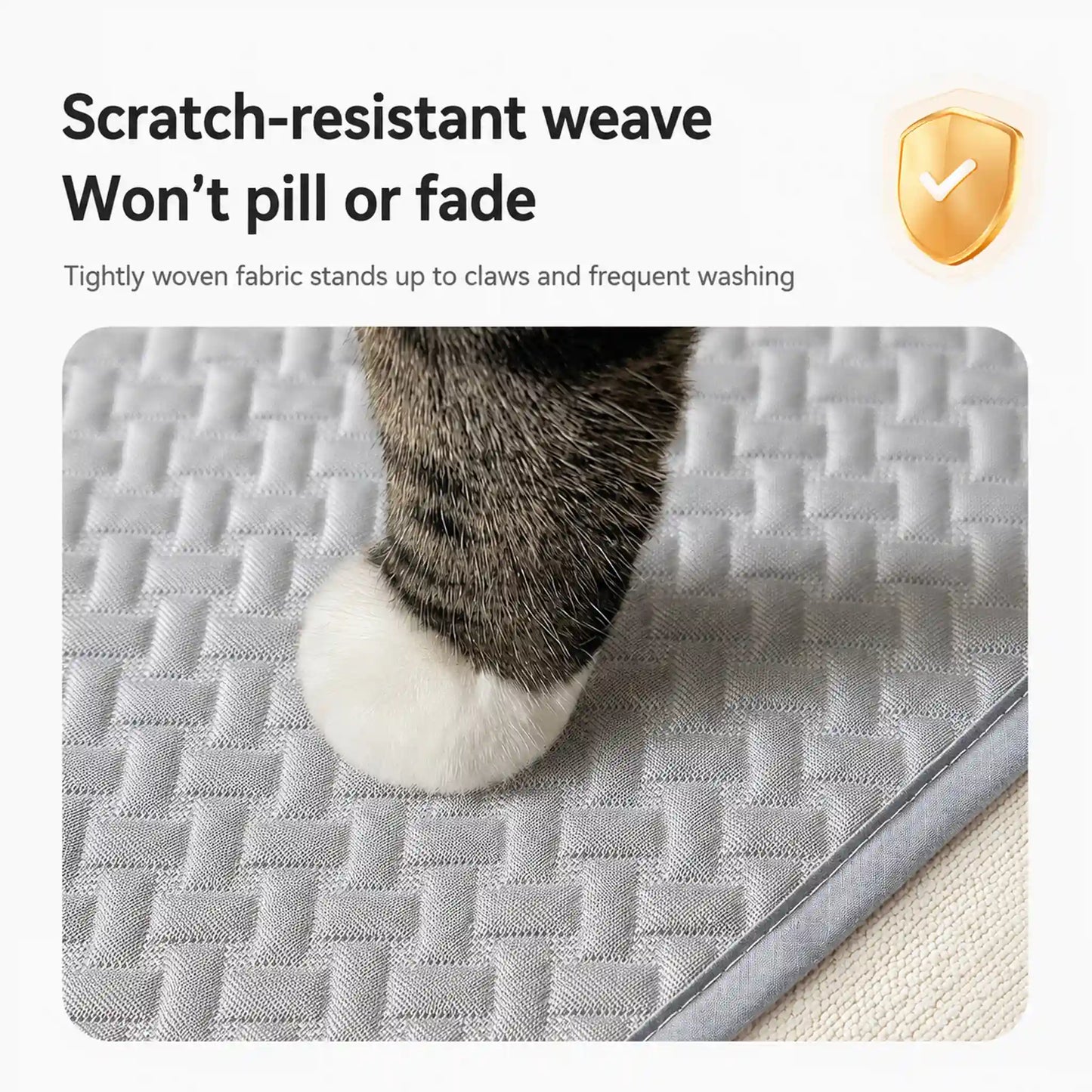Scratch-resistant ice-silk weave — won't pill or fade, cat paw close-up