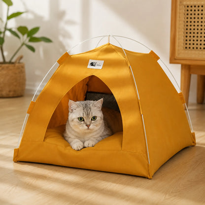 Cat resting inside a mustard yellow foldable pet tent bed in a clean indoor room