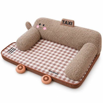 Coffee car-shaped pet bed with taupe bolsters, gingham sleeping mat and fabric wheels.