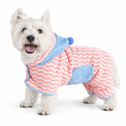 A West Highland White Terrier wearing a pink and blue hooded coral-fleece pet bathrobe on white