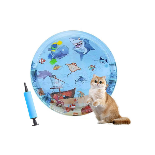 Pet water sensory play mat with ocean graphic on white background, beside a ginger kitten and the included blue hand pump.