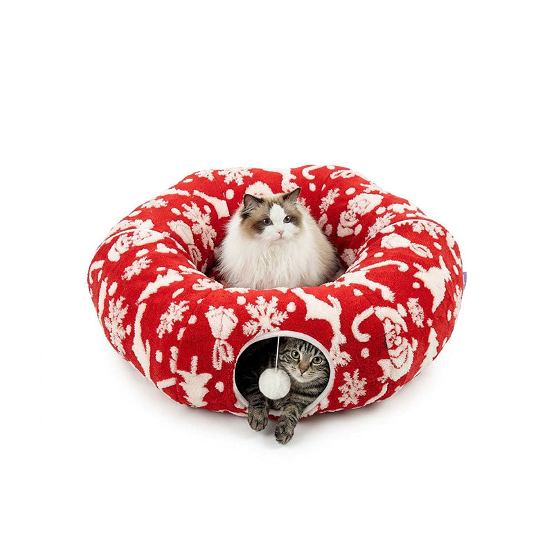 Festive Red Reindeer variant — Ragdoll cat lounging on top, tabby peeking from the tunnel of the red reindeer donut cat tunnel bed.