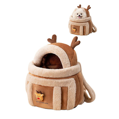 Plush reindeer pet carrier backpack with cream trim, soft antlers, and small white dog peeking out.