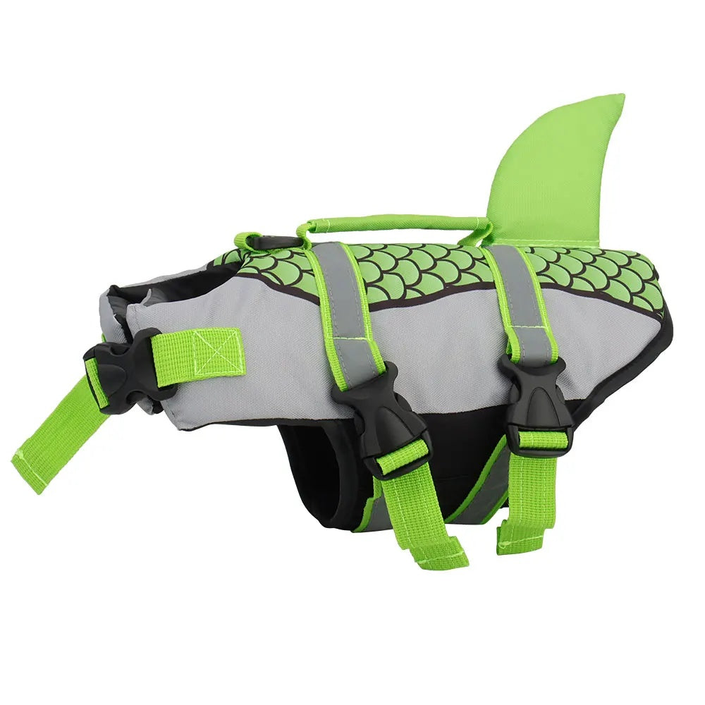 Side view of a neon green shark fin dog life jacket showing the adjustable belly straps and reflective trims.