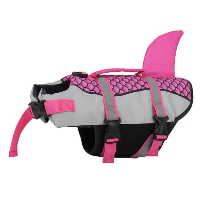 Hot pink dog life jacket with fish scales and a standing shark fin designed for small to large dogs.