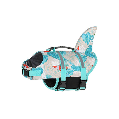 Shark fin dog life jacket with teal straps and tropical leaf print on a white background.