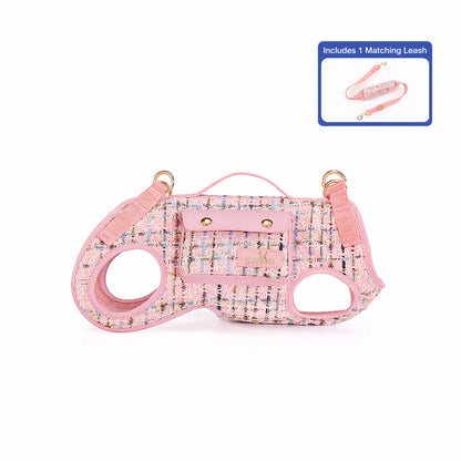 Pink tweed dog carrier harness with multicolor thread accents, matching leash, gold-tone hardware, and front magnetic pocket