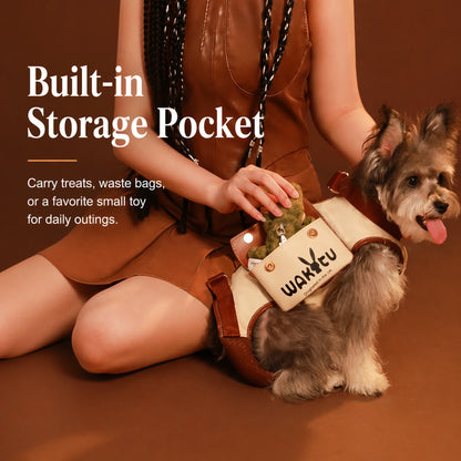 Built-in leather storage pocket on the cream dog carrier harness for treats and waste bags