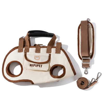 Cream mocha horizontal dog carrier with strap, leash, and front pocket