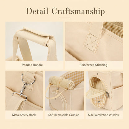 Detail craftsmanship — padded handle, reinforced stitching, metal hook, removable cushion, side window
