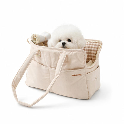 Cotton pet travel carrier tote with white dog inside — main view