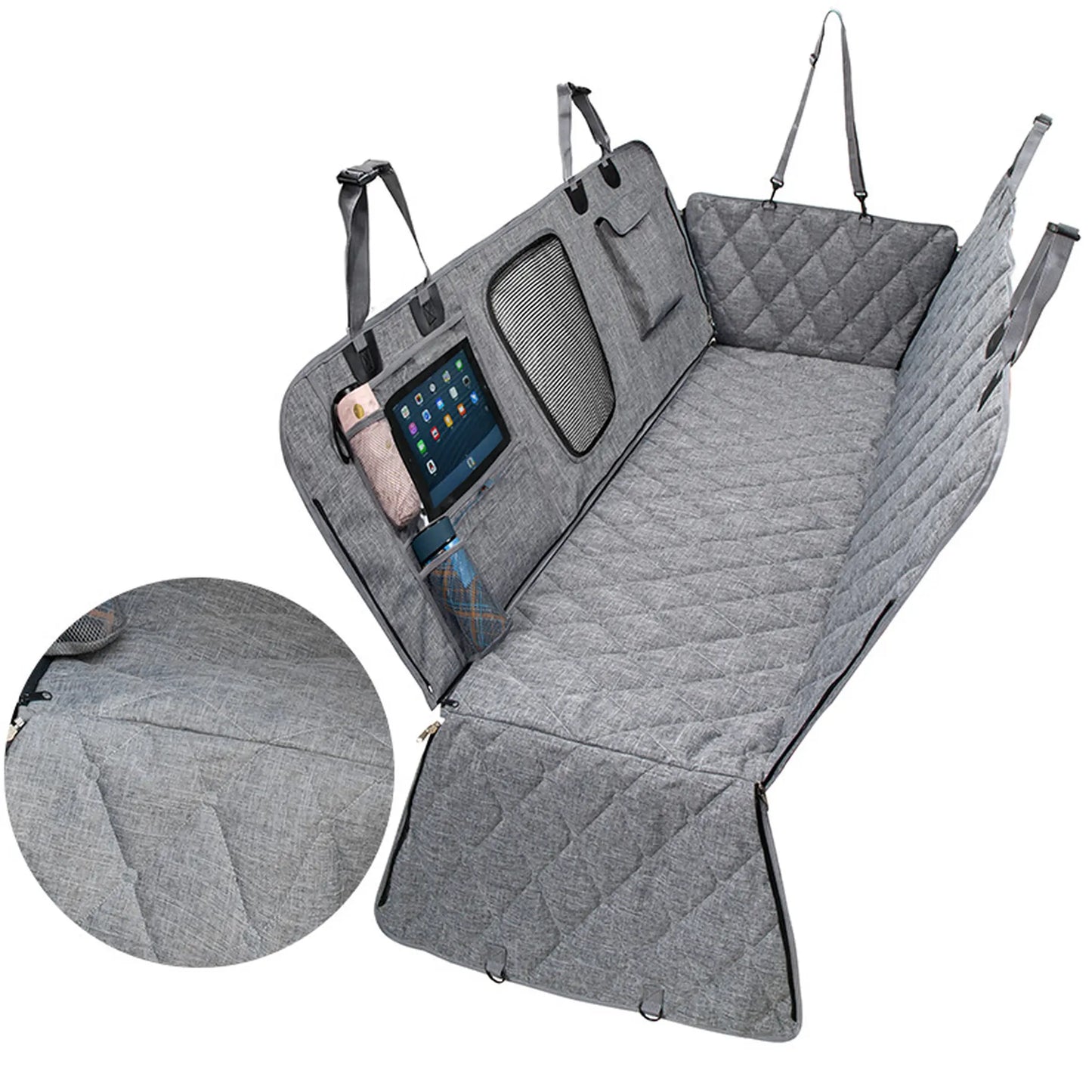 Close-up of diamond quilting and reinforced stitching on gray dog car seat cover
