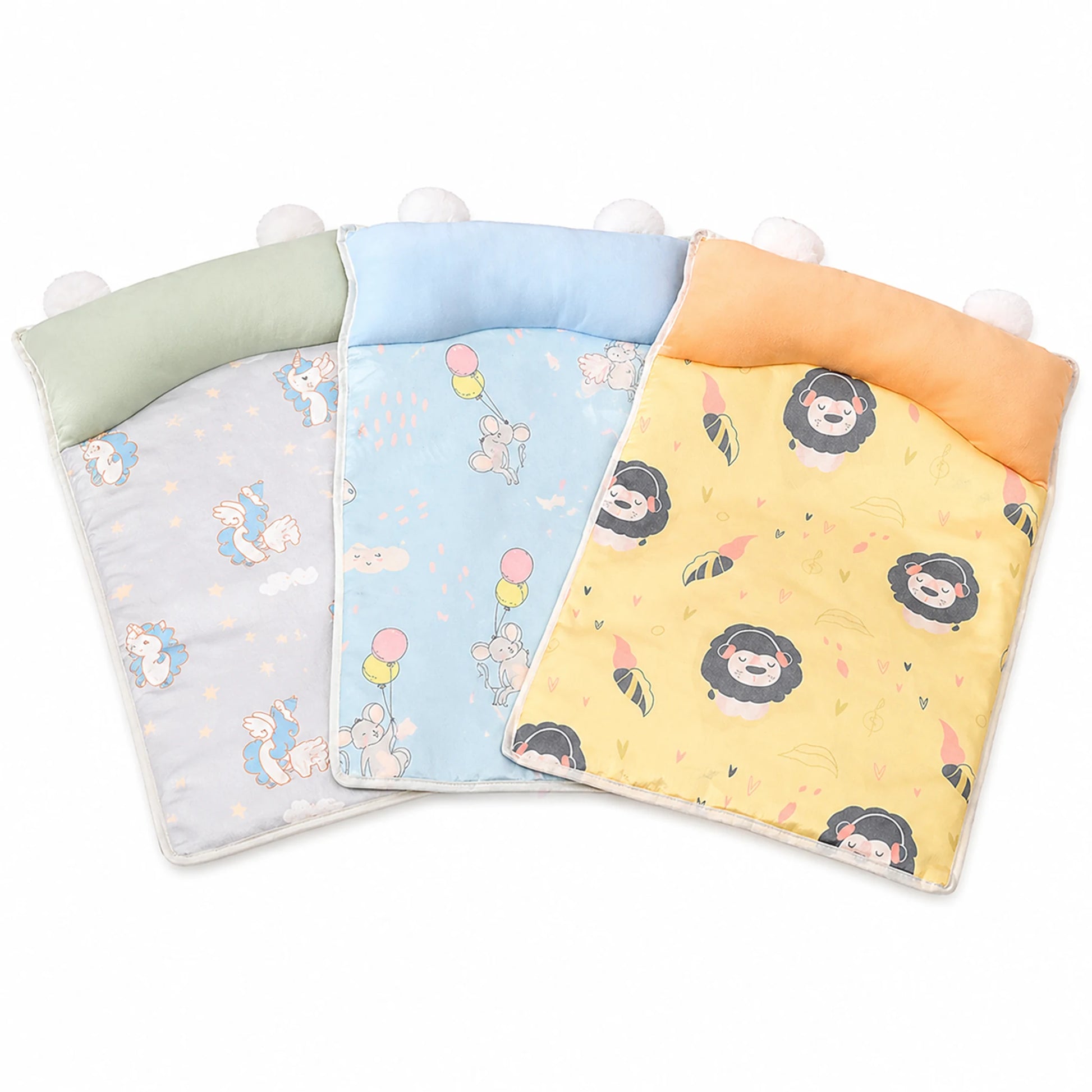 Cooling pet sleeping mat in three colorways: Yellow Lion, Blue Mouse, Green Unicorn