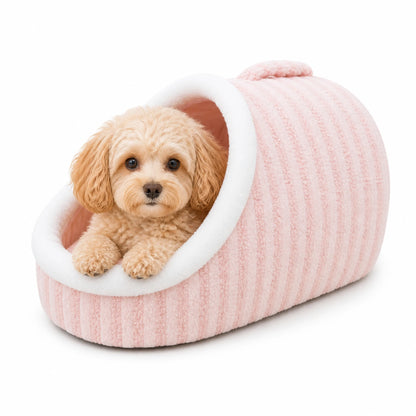 Maltipoo dog peeking out of a pink slipper-shape plush pet cave bed with white trim