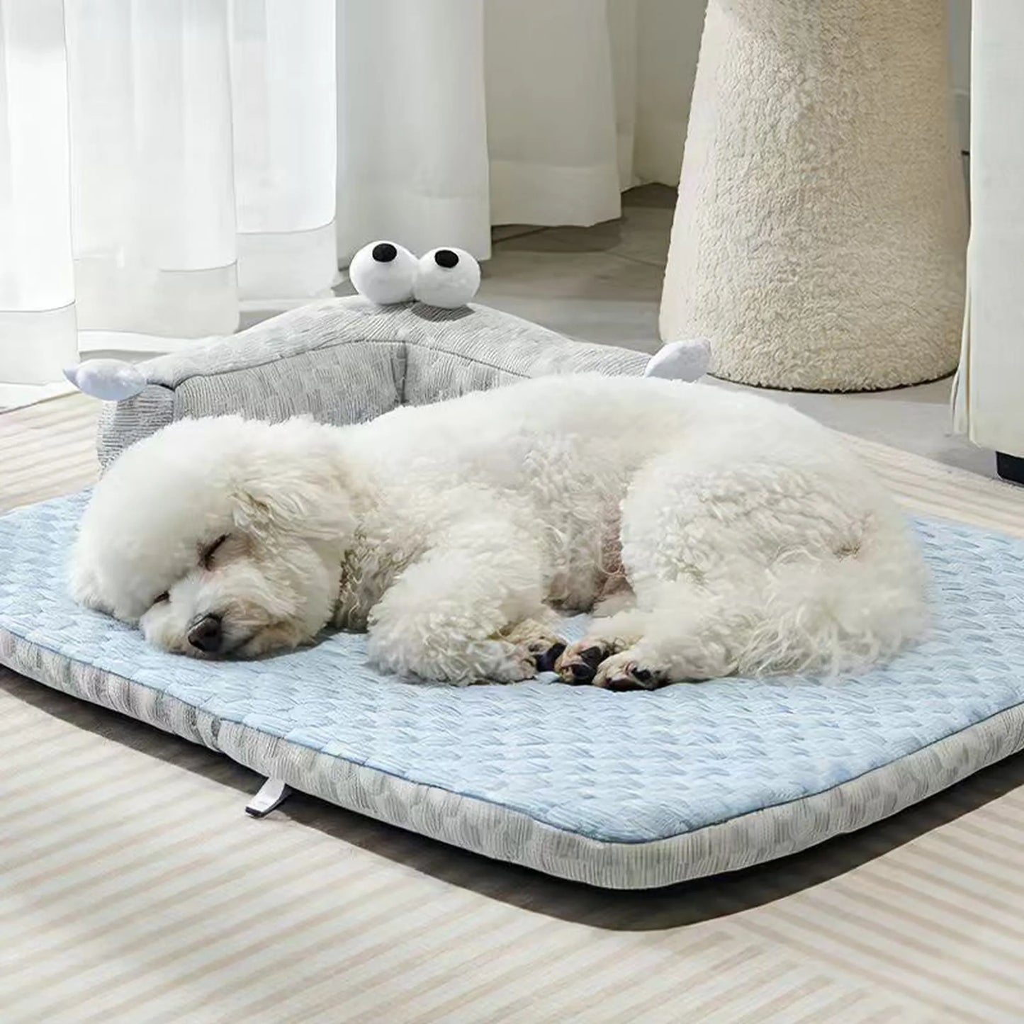 Bichon dog sleeping closeup on cooling pet mat showing waffle fabric texture