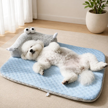 Bichon Frise stretched out on Sky Blue cooling pet mat with L-bolster pillow in a bright living room