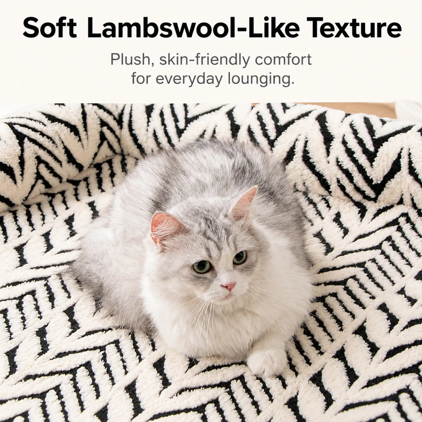 Soft lambswool-like texture on black and white plush sofa pet bed
